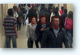 Faces detected in a hallway.